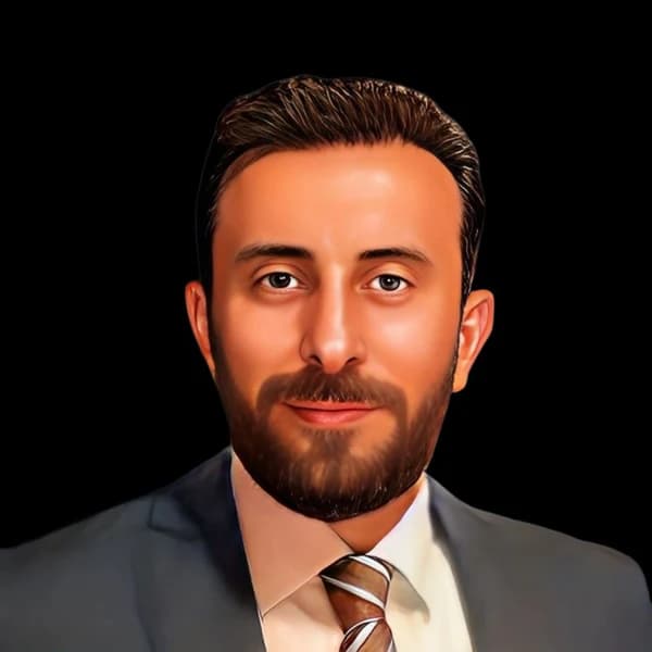Avatar of Essam Alsaloum in a formal suit with a dark background